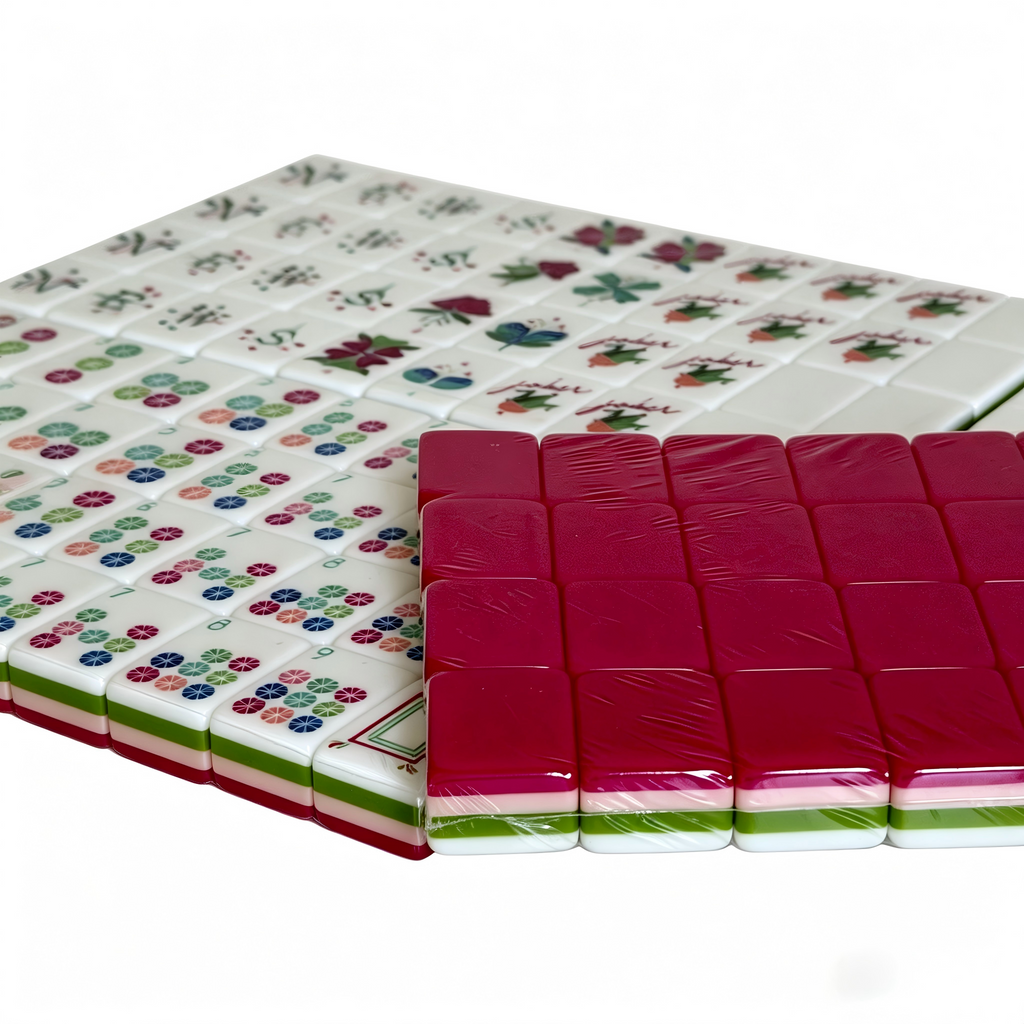 Close-up of Electric Rose American Mahjong set tiles with vibrant hot pink acrylic backs and bold gold inlays by USA Mahjong Co.