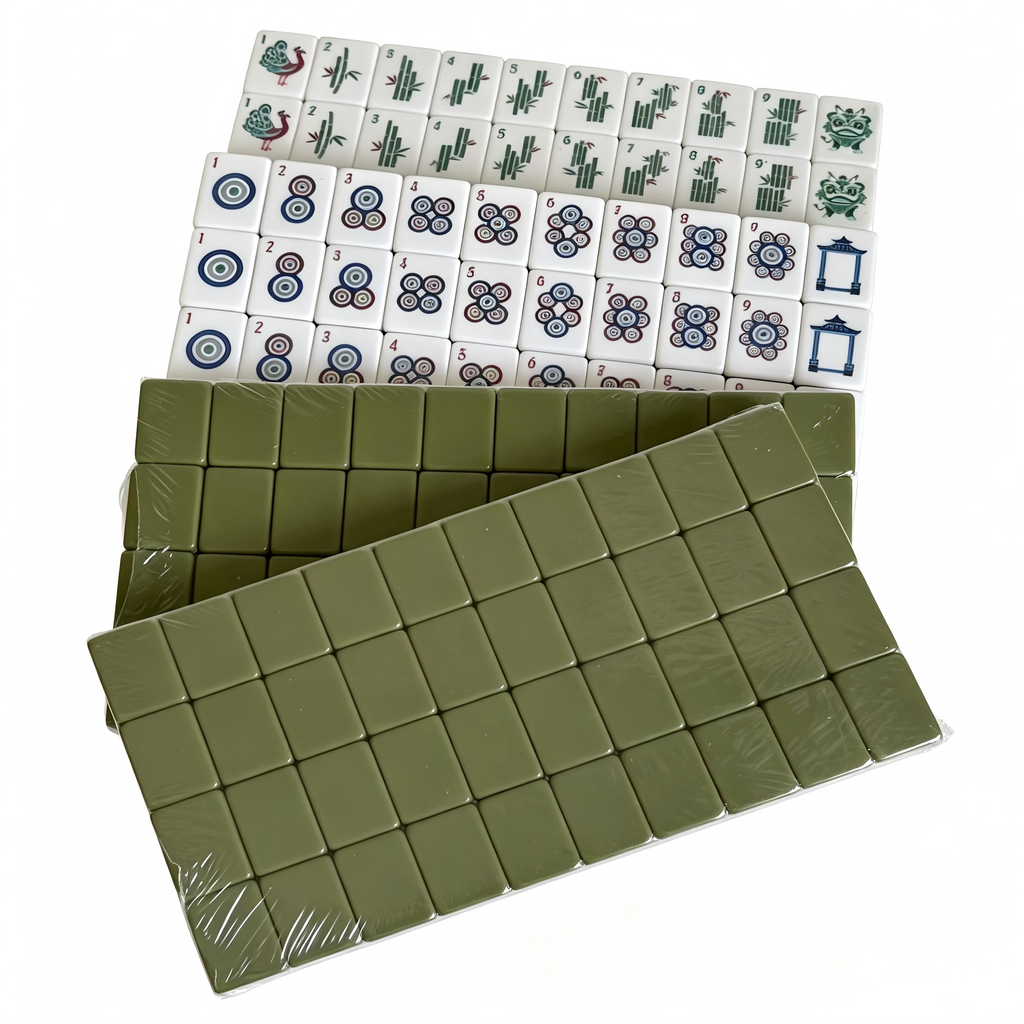 Detailed view of The Olive Grove American Mahjong Set by USA Mahjong Co. with 166 weighted acrylic tiles featuring earthy sage green backs.