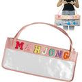American Mahjong Co. Clear Shore Tote bag with PVC material, shoulder strap, and chenille lettering, designed for carrying Mahjong sets.