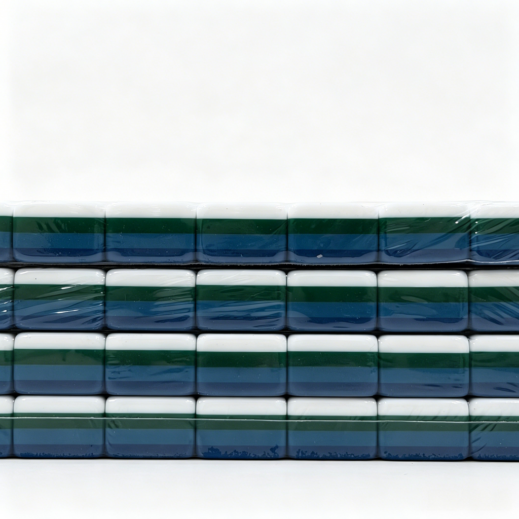 Side profile of 32g weighted teal Mahjong tiles with deep petrol backs from the USA Mahjong Co. American Mahjong Set.
